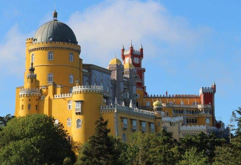 Pena Palace at Sintra. Planning a day trip to Sintra is one of the best things to do. But how to get to Sintra from Lisbon easily?