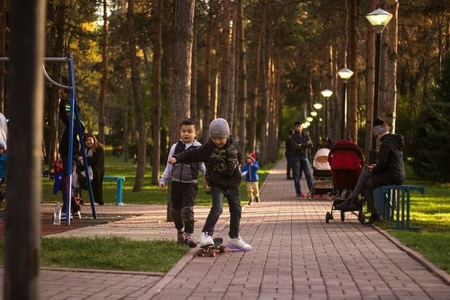 kids playing in Cenytral Park Almaty