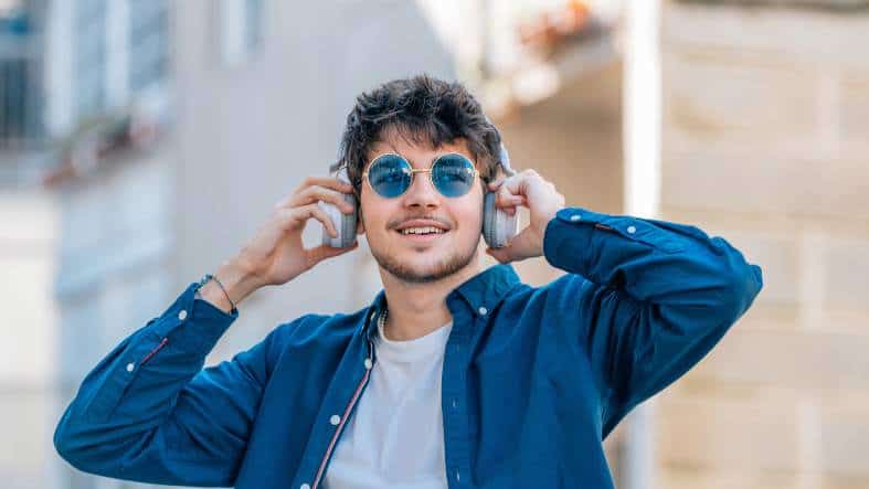 A teenage boy on holiday in sunglasses