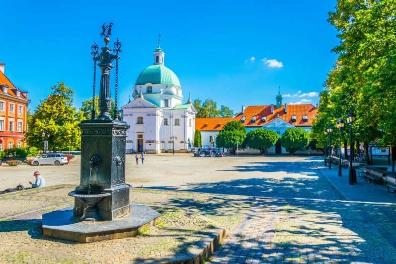 A nice city square with a fountain in the Warsaw new town area