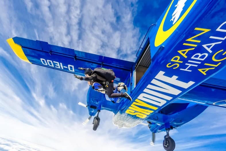 A tandem skydiving moment over England