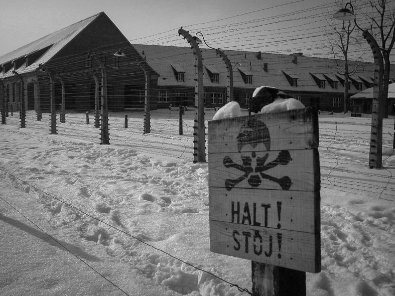 A warning sign out the front of Auschwitz in Poland