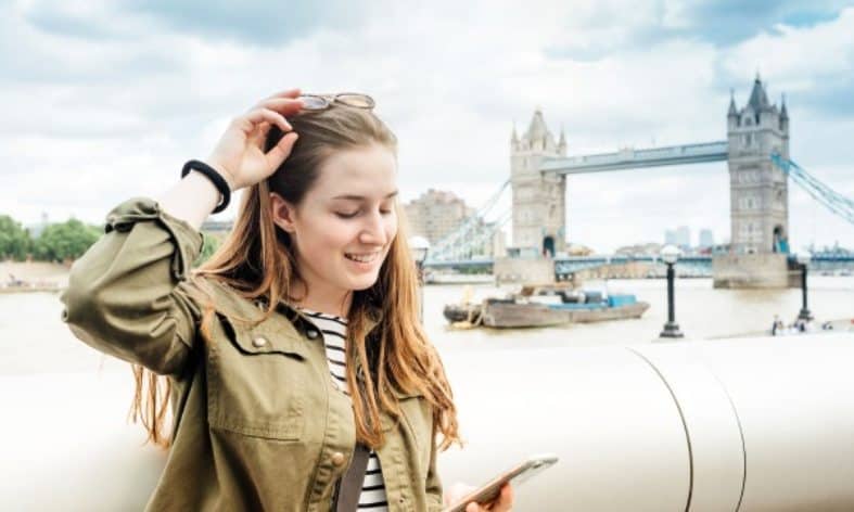 A teenager in London near tower bridge