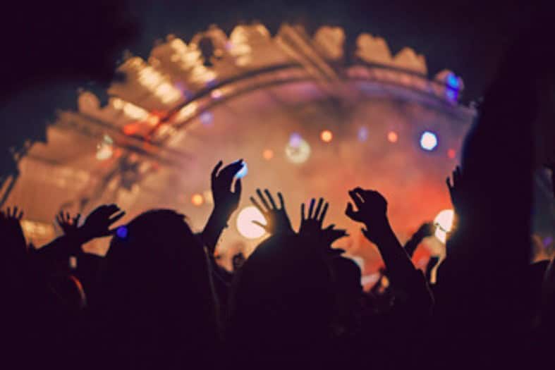 a crowd at a music festival in Poland