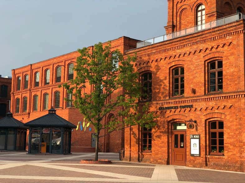An old red brick building on Lodz that has been repurposed