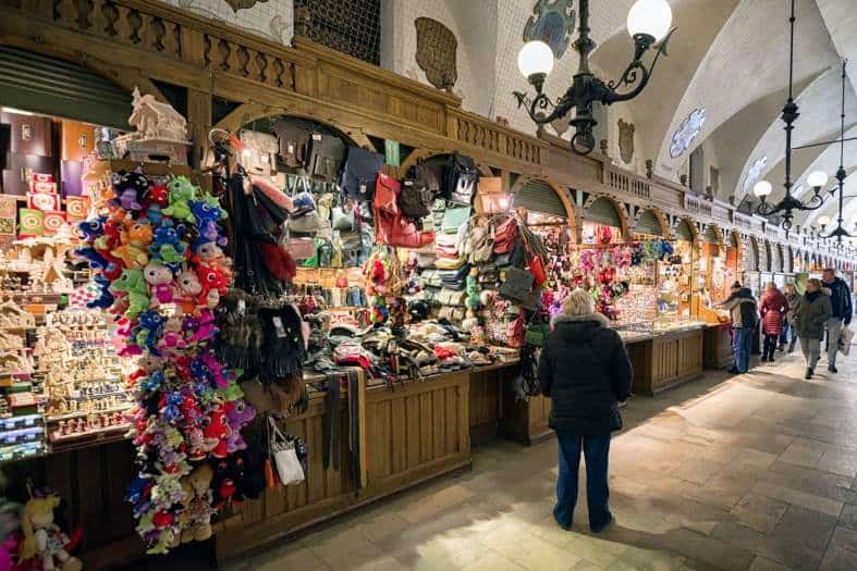 stalls selling crafts and souvenirs inside the Cloth Hall in Krakow Poland