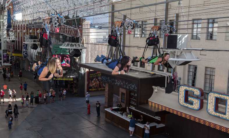 Slotzilla Zipline in Las Vegas, a towering zip line structure with colorful lights, located on the Fremont Street