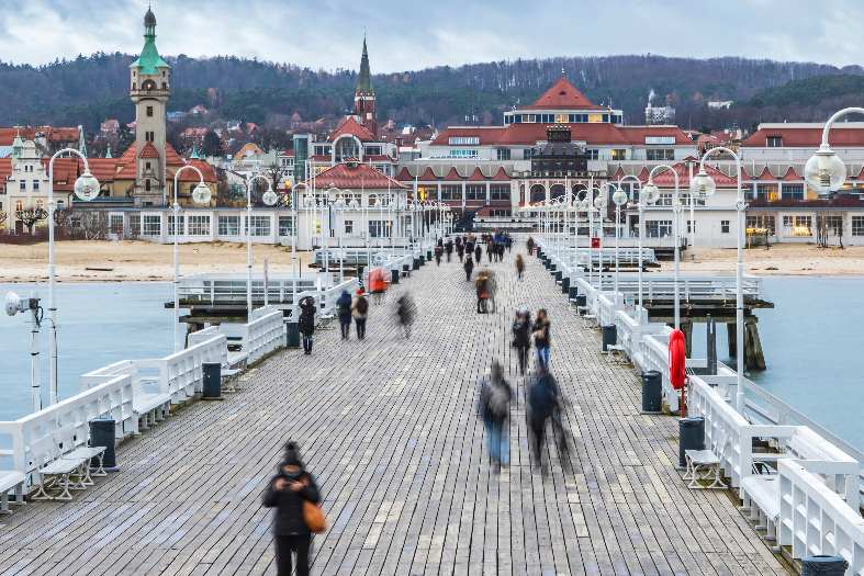 Visitors and locals out exploring the sopot pier